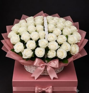 50 White Rose pcs inside the basket