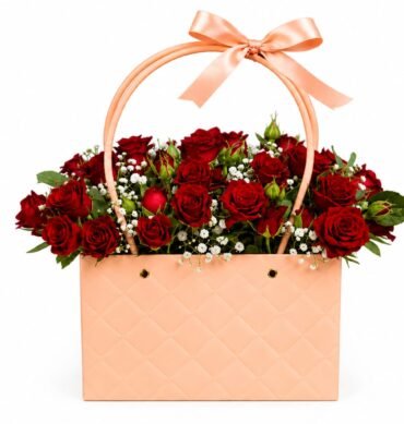 Red Spray Roses and baby breath inside the bag