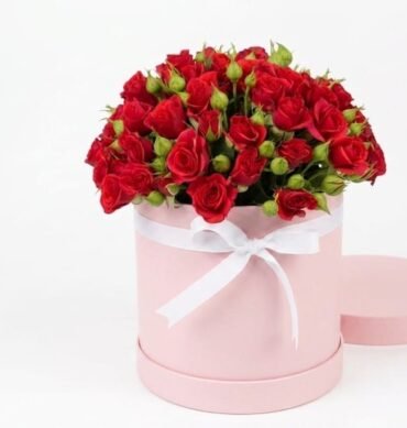 Red spray roses inside the round box best gift every occasion